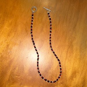 Red, black and white beaded necklace